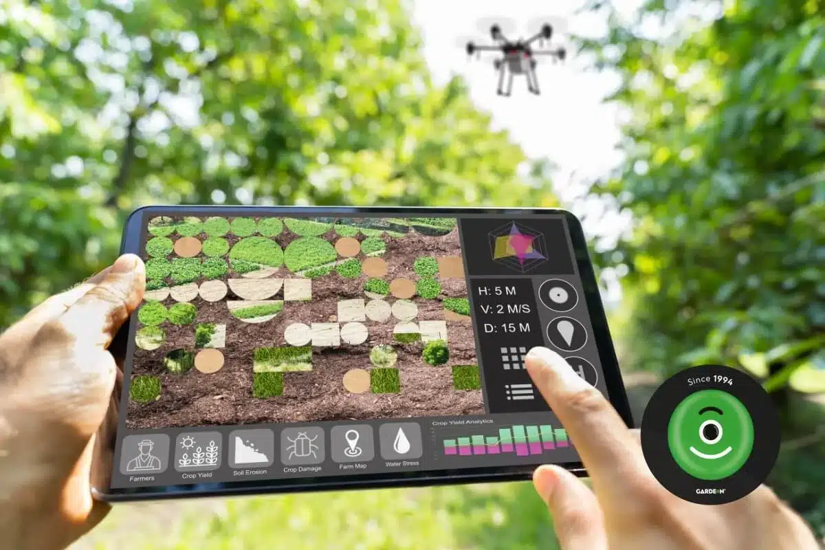 Agrikulturní aplikace na tabletu, v pozadí dron.